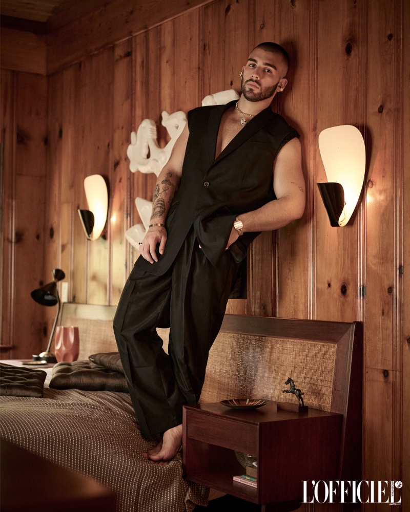 Donning a sleeveless blazer, Manuel Turizo appears in a new photoshoot.