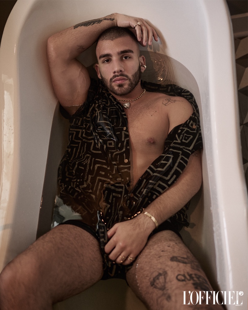 Singer Manuel Turizo soaks in a tub for a L'Officiel Argentina photoshoot.