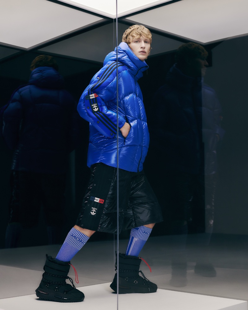 Nikita Stsjolokov wears a Moncler x adidas Originals Beiser padded nylon laqué coat and lace-up padded Gore-Tex Moncler NMD boots.