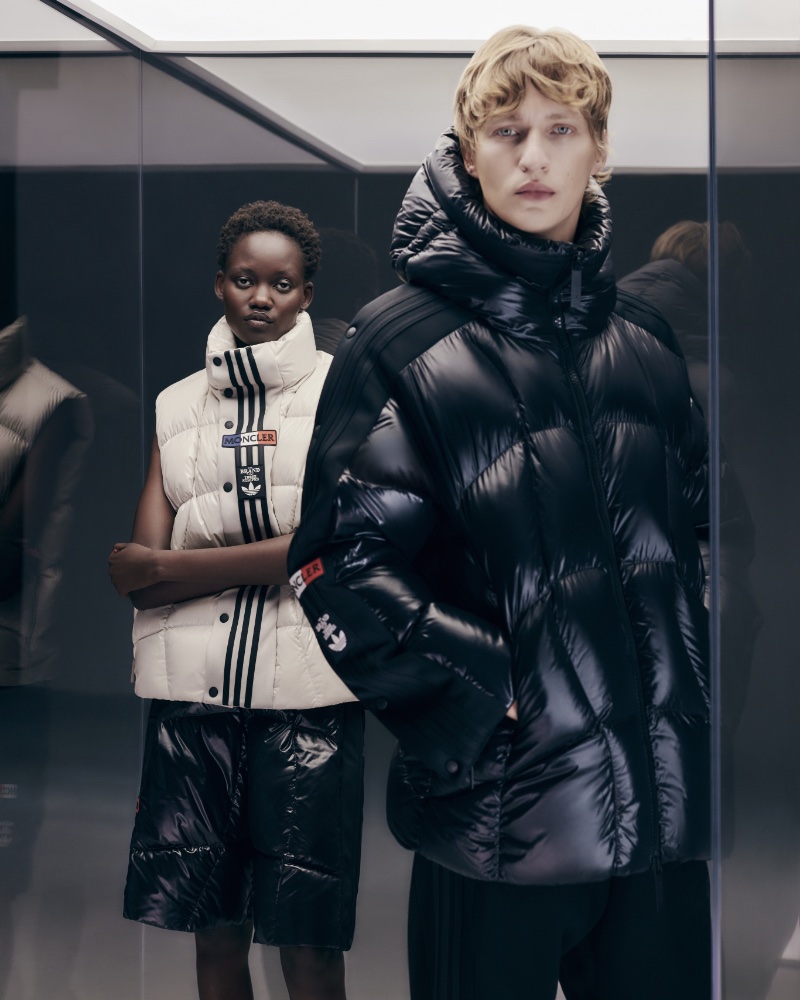 Pictured alongside Caren Jepkemei, Nikita Stsjolokov wears a Moncler x adidas Originals Beiser padded nylon laqué coat.