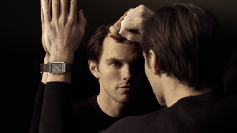 Nicholas Hoult appears in a striking advertising image for Jaeger-LeCoultre. 