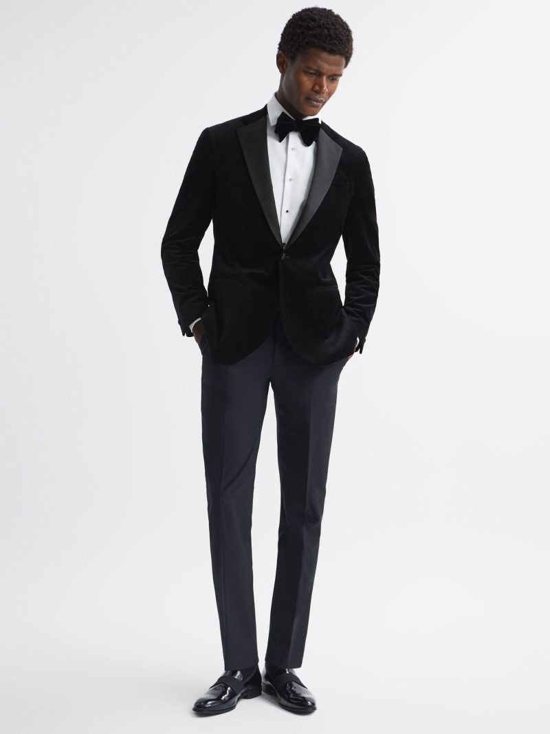 Dress to impress in a dapper velvet tuxedo jacket.