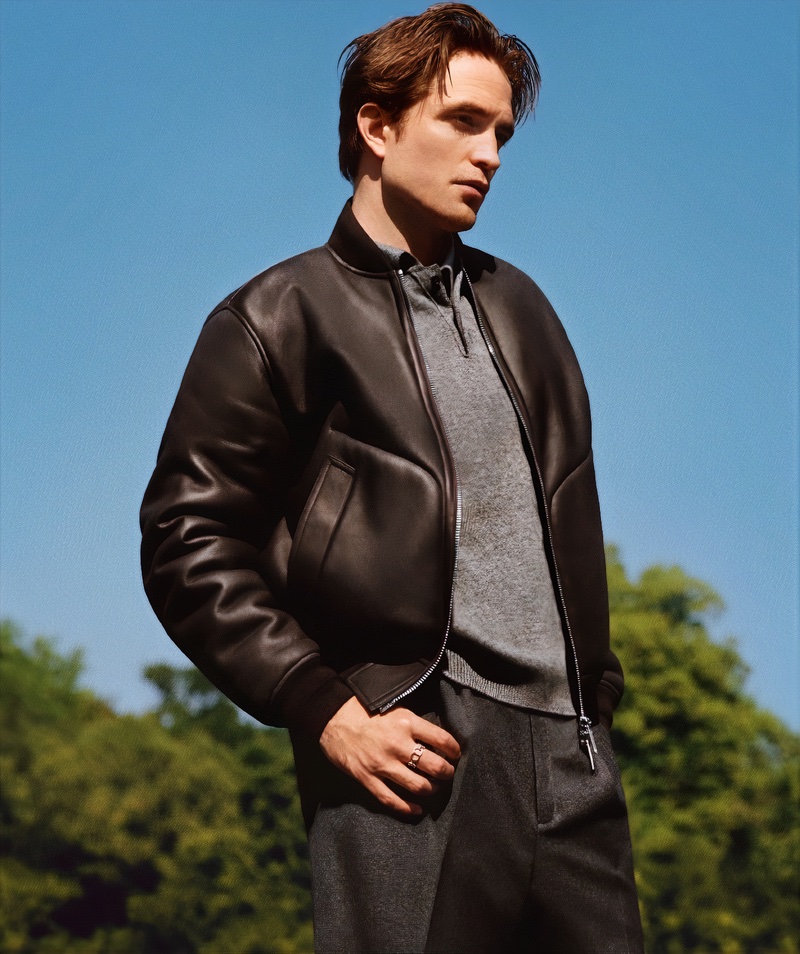 Robert Pattinson sports a leather bomber jacket over a polo and trousers for the Dior New Icons campaign.