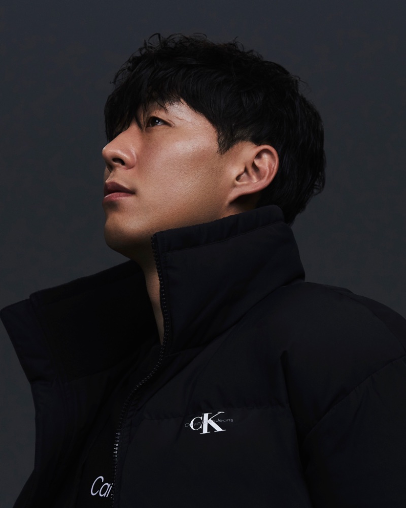 Calvin Klein enlists Son Heung-min to wear its latest outerwear, including this season's puffer jacket.