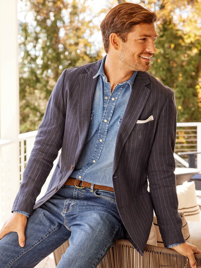 Embrace smart-casual style by pairing denim with a sports coat.