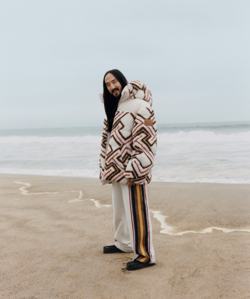 Taking to the beach, Steve Aoki wears a look from the Tommy x Pendleton collection.