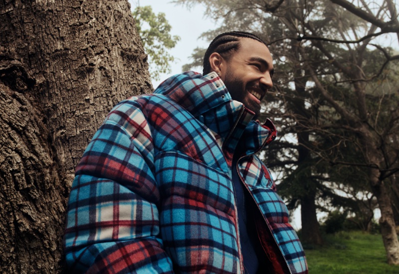 Sage Elsesser rocks the Tommy Hilfiger New York Flannel Tartan Puffer jacket. 