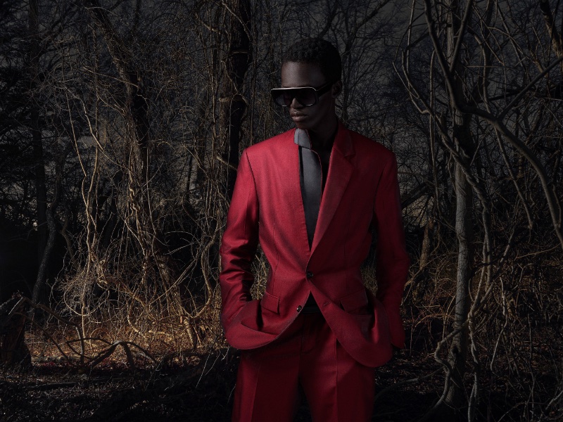 Mamuor Majeng dons a red suit from the Zara Studio fall-winter 2023 collection.