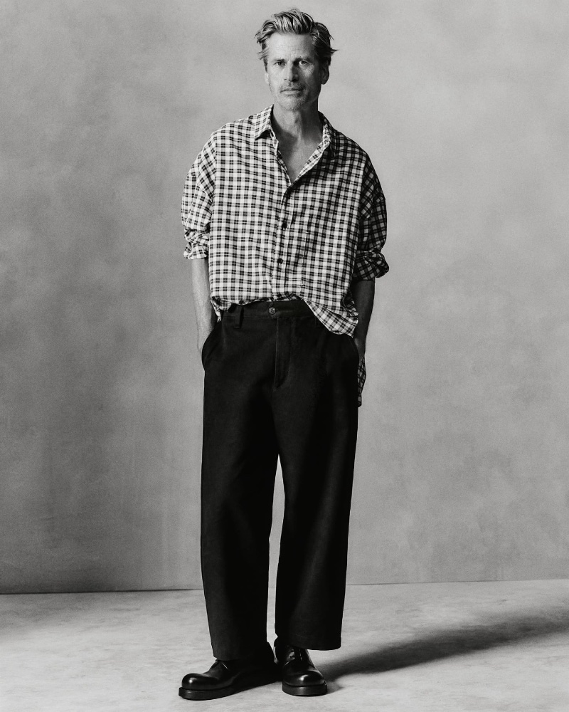 Mark Vanderloo takes the spotlight in a Zara checkered oversize fit shirt with balloon fit pants and round toe leather derby shoes.