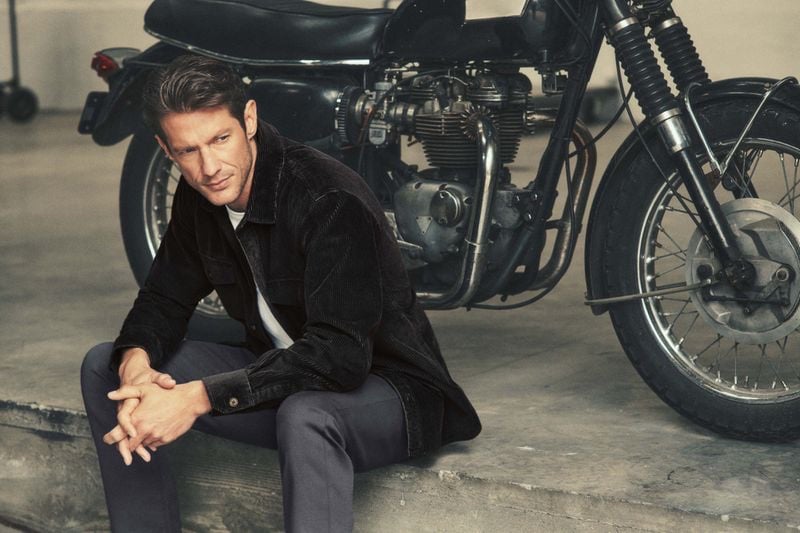 Against the backdrop of a classic motorcycle, this 34 Heritage ensemble modeled by Domenique Melchior, delivers rugged sophistication for the holiday season. » Neutral Nuances: Exploring 34 Heritage Holiday Collection Against the backdrop of a classic motorcycle, this 34 Heritage ensemble modeled by Domenique Melchior, delivers rugged sophistication for the holiday season.