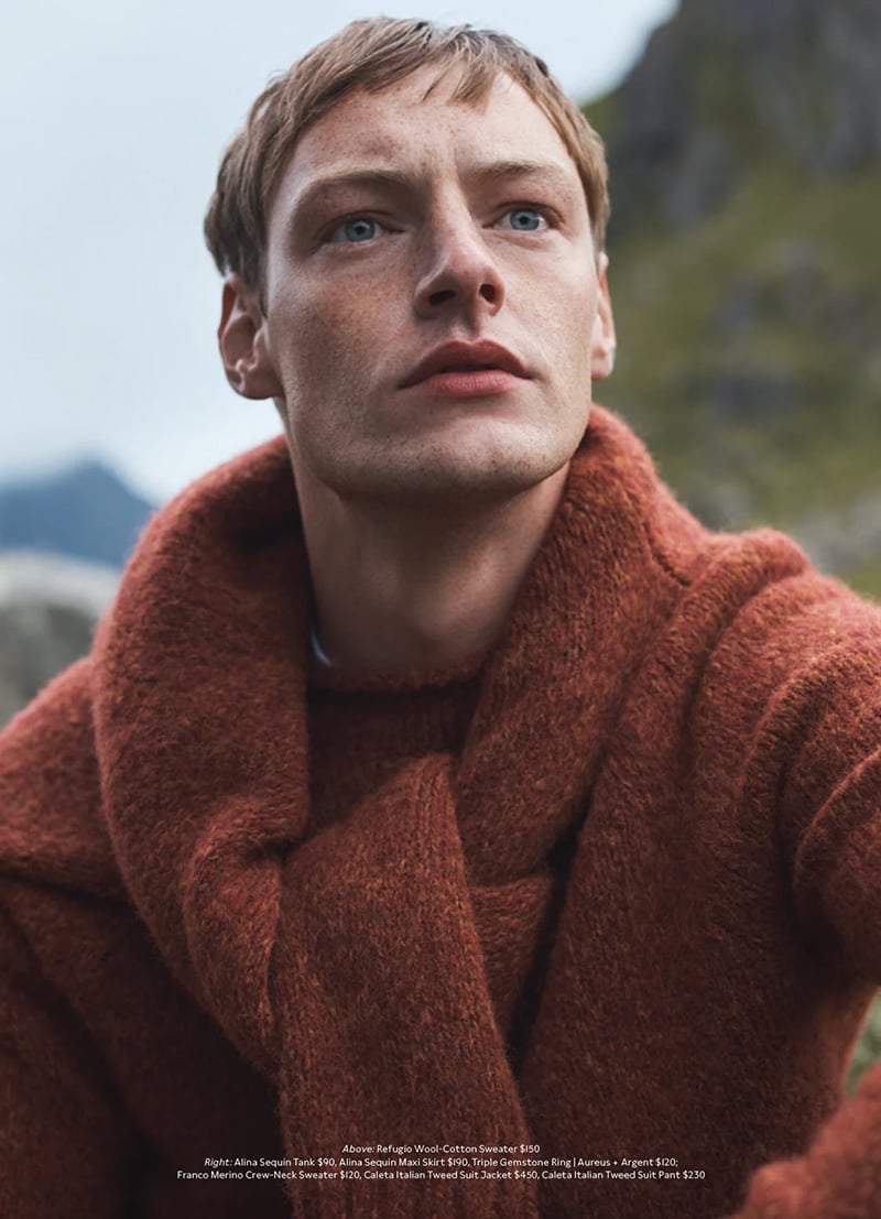 Roberto Sipos gazes into the distance, wrapped in the warmth of a terra cotta sweater, embodying the serene spirit of the holiday season for Banana Republic. 