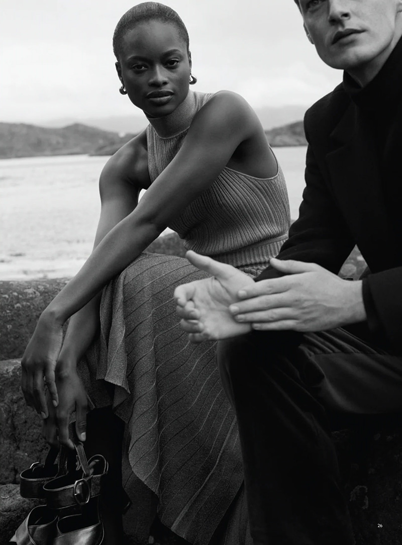Roberto Sipos embodies relaxed sophistication alongside a model by the sea for Banana Republic's holiday collection.