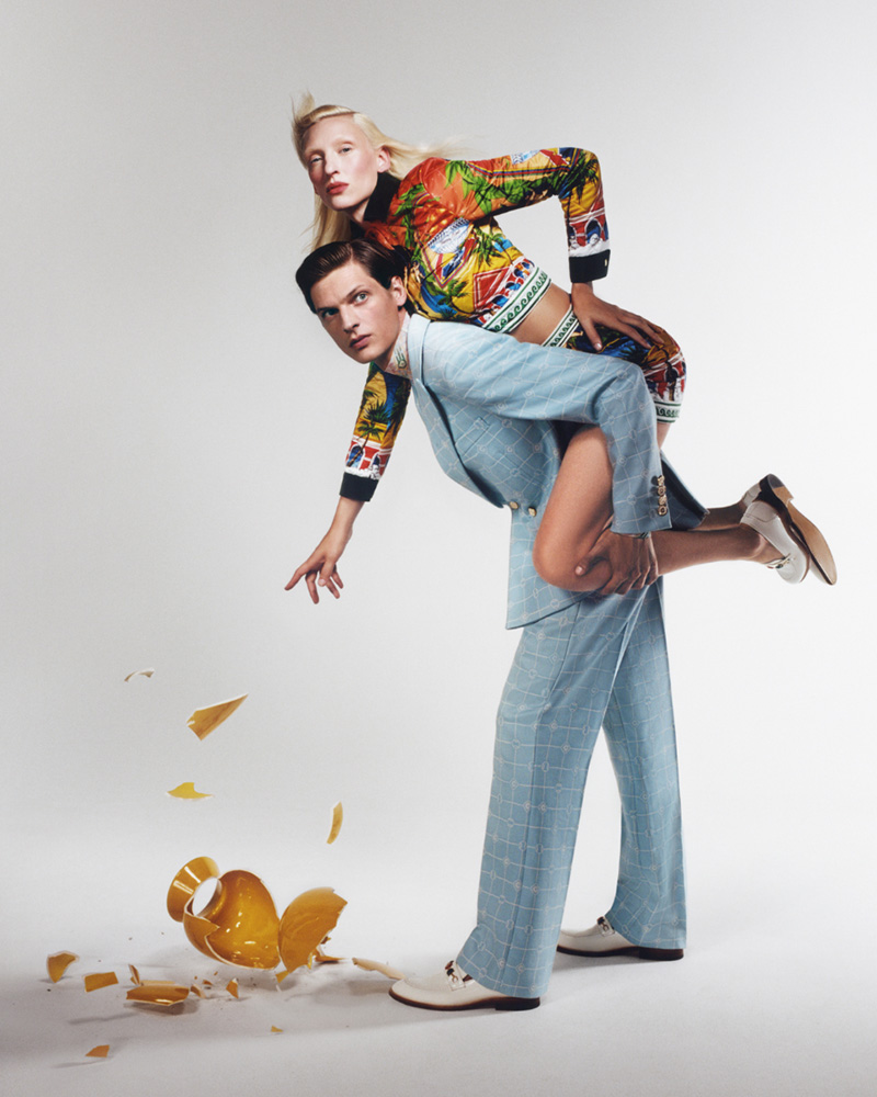 Valentin Caron playfully supports his co-model Maggie Maurer in a whimsical Casablanca ensemble, adding a touch of the unexpected to the pre-spring 2024 campaign.