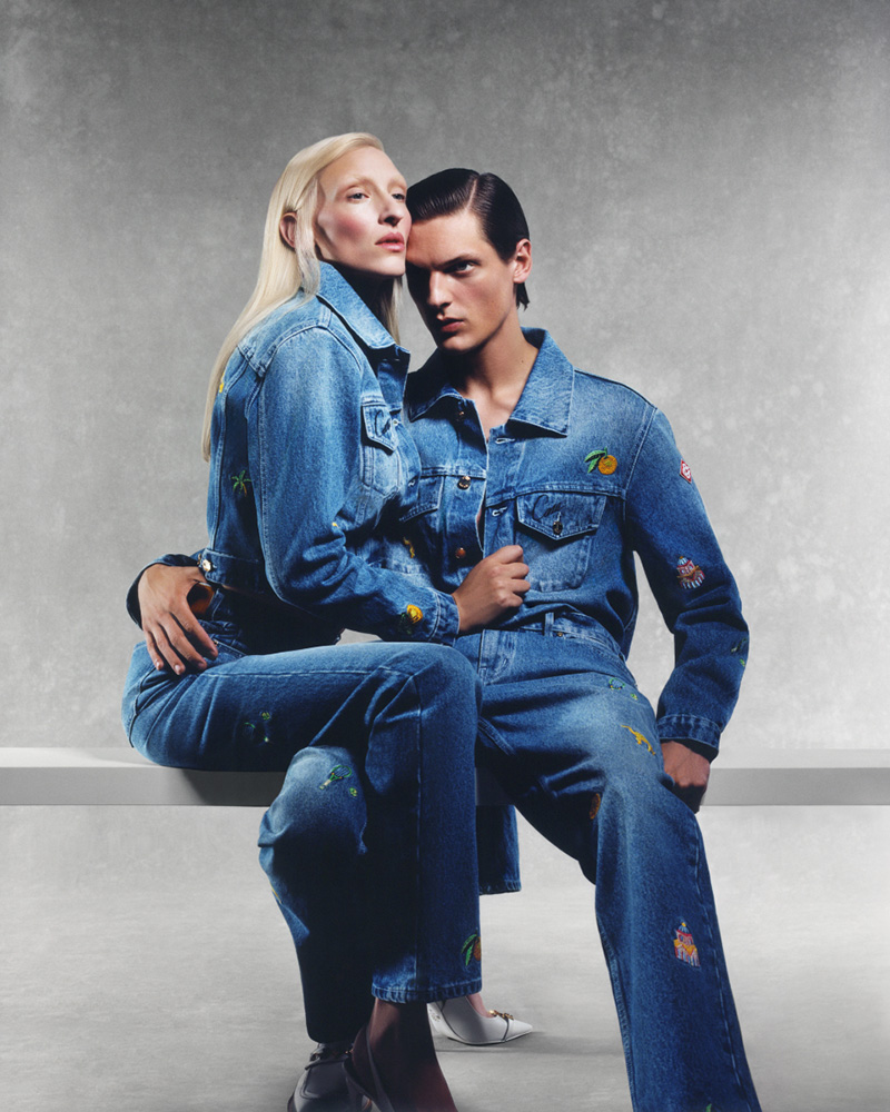 Maggie Maurer and Valentin Caron strike a pose in matching denim, channeling the vibrant and playful spirit of the Casablanca pre-spring 2024 collection.