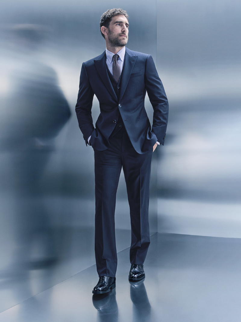 British model Will Chalker wears a three-piece suit for the Giorgio Armani Made to Measure fall-winter 2023 campaign.