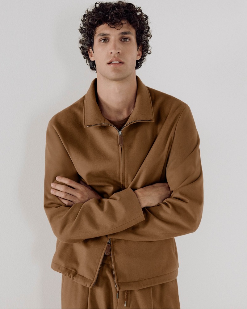 Francisco Henriques captivates in a Vicuña zip-up jacket paired with matching trousers for a seamless, monochromatic look.