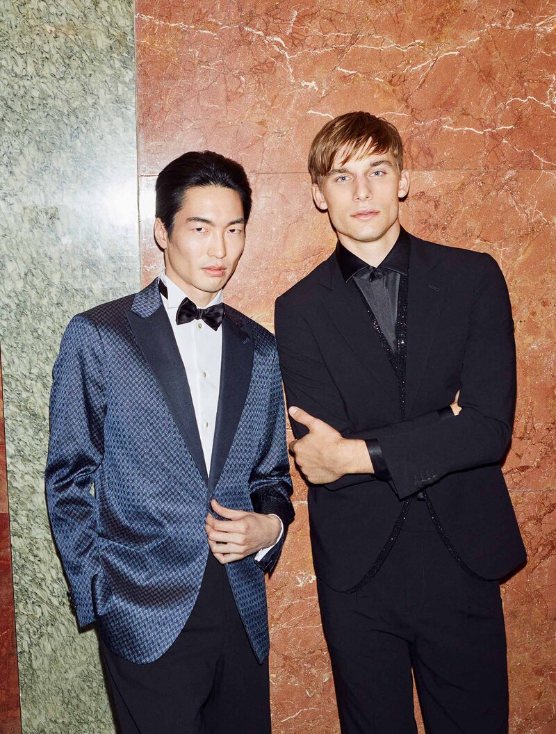 Models Mikkel Matthiesen and Se Oh channel timeless elegance in Giorgio Armani.