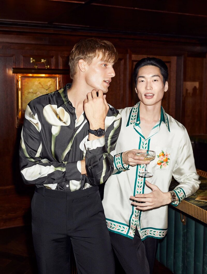 Mikkel Matthiesen and Se Oh effortlessly embody relaxed sophistication with their charismatic presence and stylish shirts from Lanvin and Casablancas.