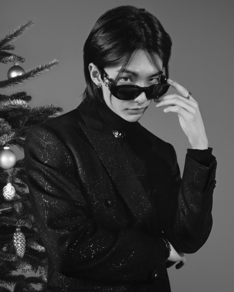 Wearing all-black, Hyunjin stars in Versace's holiday 2023 campaign.