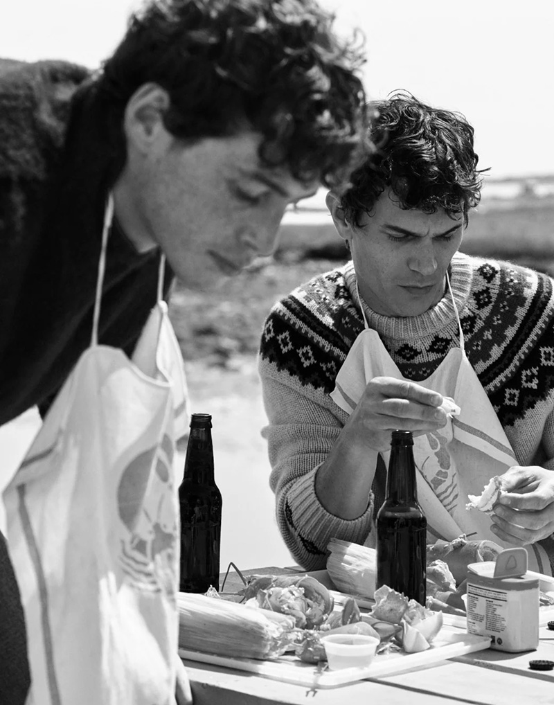 Enjoying a lobster bake, Vincent LaCrocq sports a cashmere Fair Isle sweater.