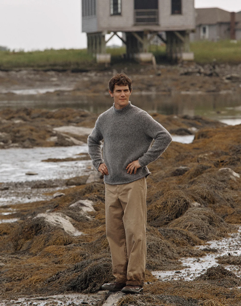 Taking to the outdoors, Vincent LaCrocq models a brushed wool roll-neck sweater with Giant-fit chinos.