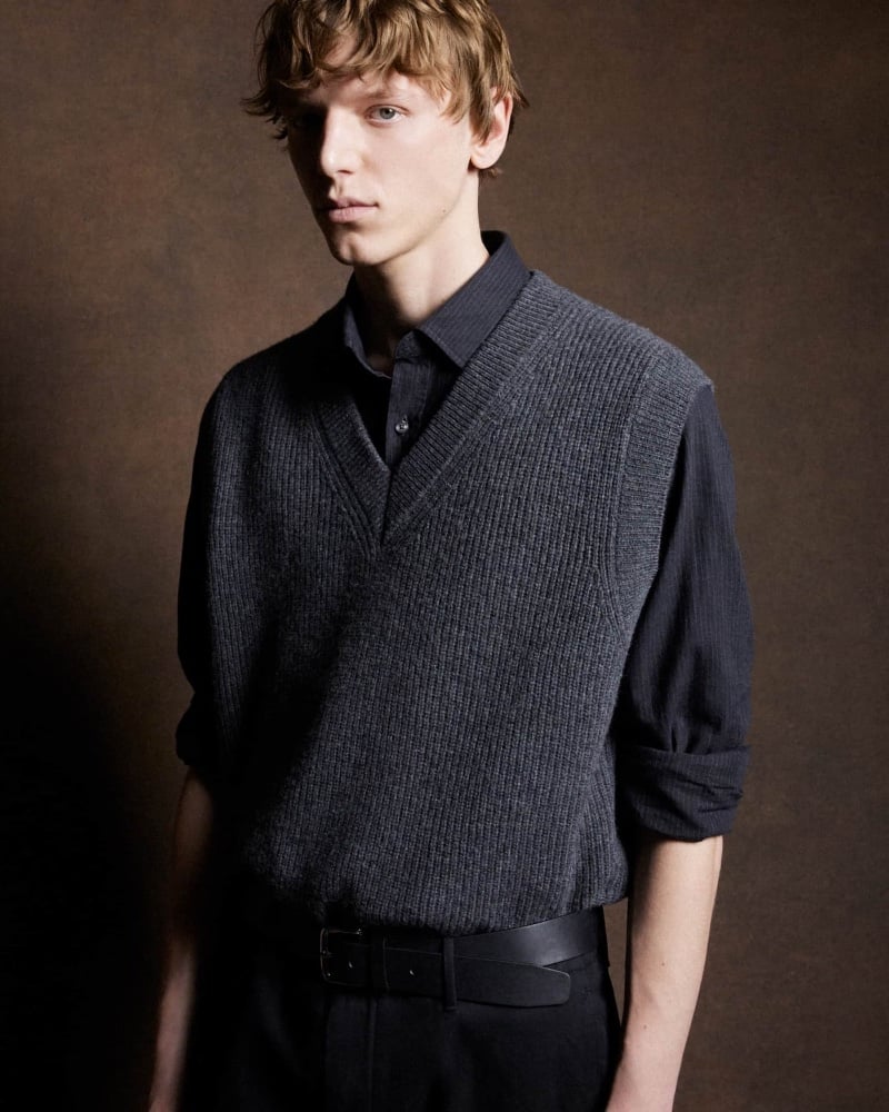 Chic minimalism from Massimo Dutti with a charcoal ribbed vest over a crisp shirt for a textured, layered look.