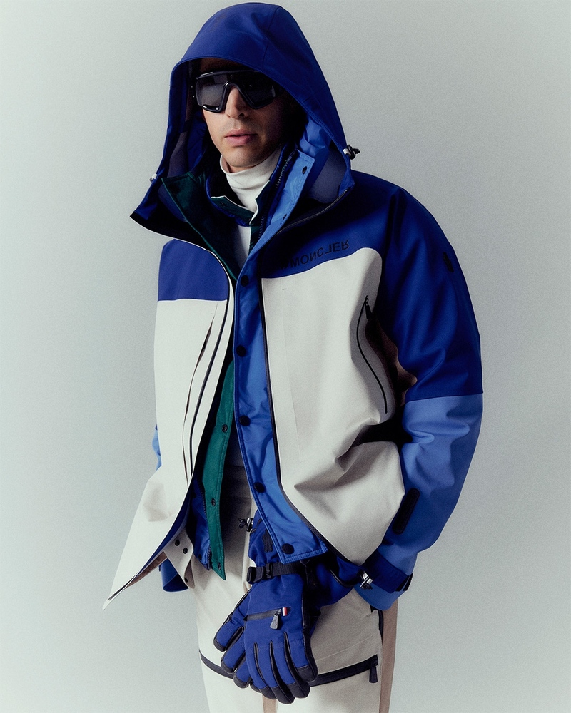 Jivago Santini embodies alpine chic in a Moncler Grenoble ski jacket, complete with sleek goggles and coordinating gloves, ready to conquer the slopes.