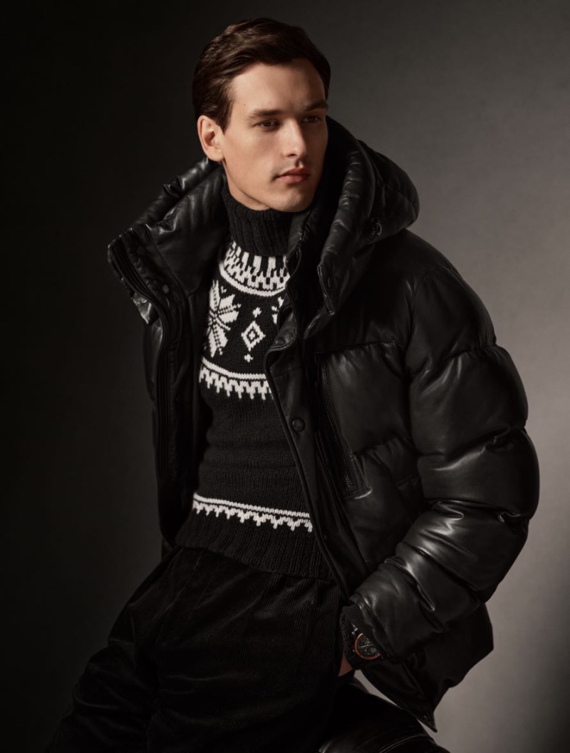 Jegor Venned wears a leather down hooded jacket from Ralph Lauren Purple Label.