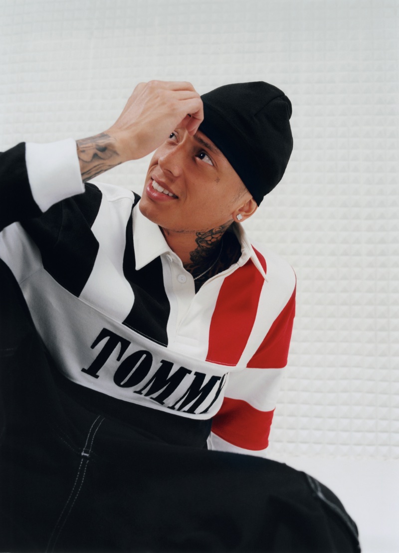 Rapper Central Cee sports a striped rugby jersey from the Tommy Jeans Remastered collection.