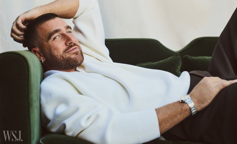 Travis Kelce lounges casually in a white sweater, juxtaposed with the rich green of a velvet chair, for WSJ. Magazine. » Travis Kelce Opens Up in WSJ: Football & Taylor Swift Travis Kelce lounges casually in a white sweater, juxtaposed with the rich green of a velvet chair, for WSJ. Magazine.