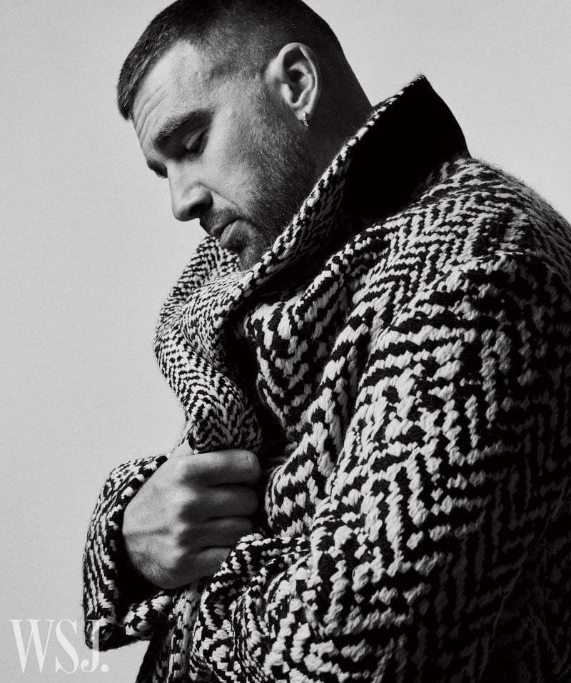 A side profile of Travis Kelce in a herringbone coat captures a moment of introspection for WSJ. Magazine.