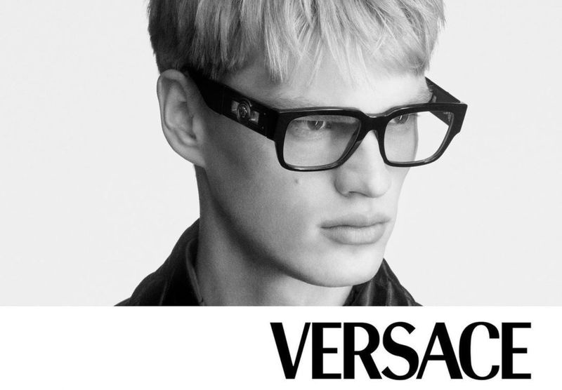 Versace enlists Filip Hrivnak as the star of its fall-winter 2023 eyewear campaign.
