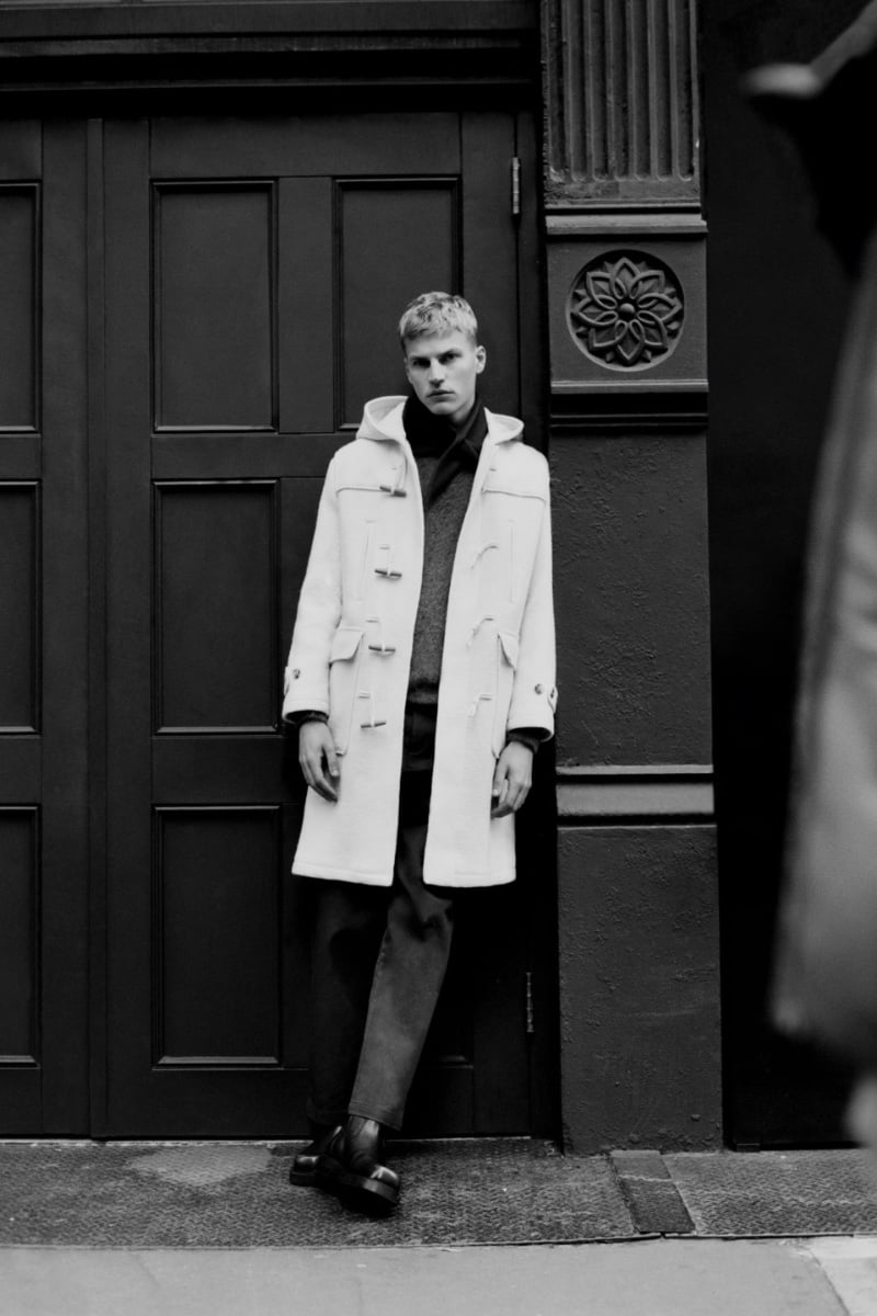 A pristine vision in a white duffle coat, Timo Pan wears Zara.