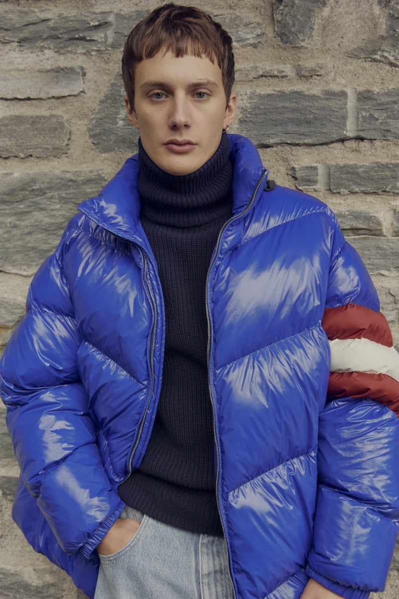 Bally embraces winter with its Mountain capsule collection featuring Gabriele Gratti in must-haves like a blue down jacket.