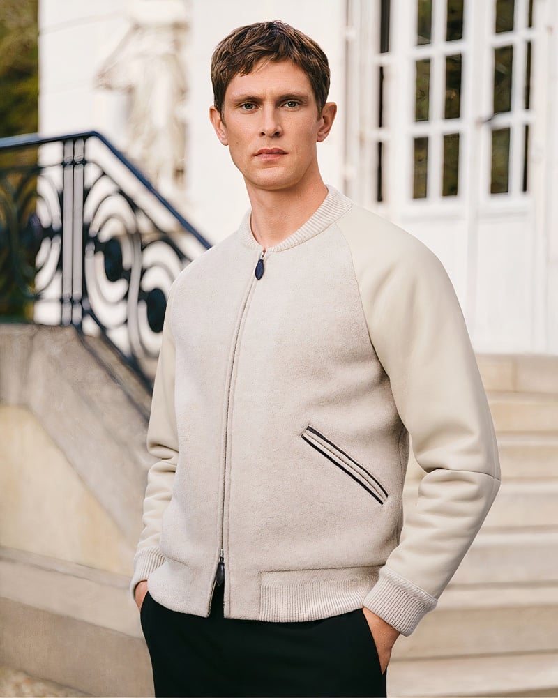 Sporting a cashmere and shearling jacket, Mathias Lauridsen exudes effortless sophistication for Berluti.