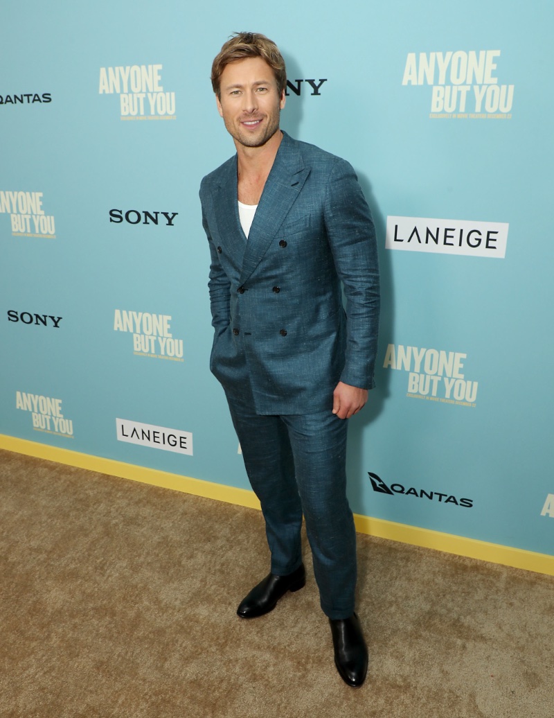 Actor Glen Powell dons a double-breasted Brioni suit for the New York premiere of Anyone But You.