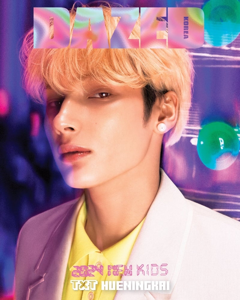 Huening Kai captivates with a soft gaze, sporting a Dior Men pastel suit for the cover of Dazed Korea.