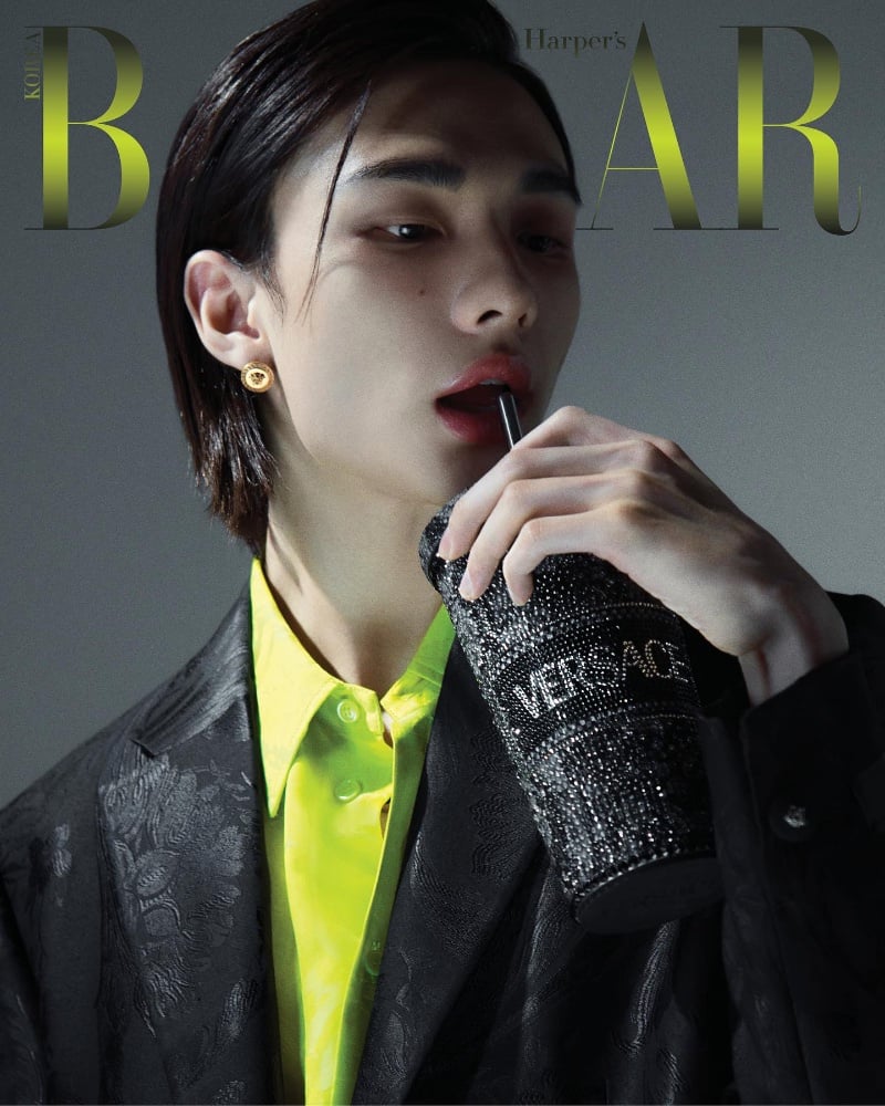 Hyunjin captivates in a luminescent lime Versace shirt and a Barocco print suit jacket for the December 2023 Harper's Bazaar Korea cover.
