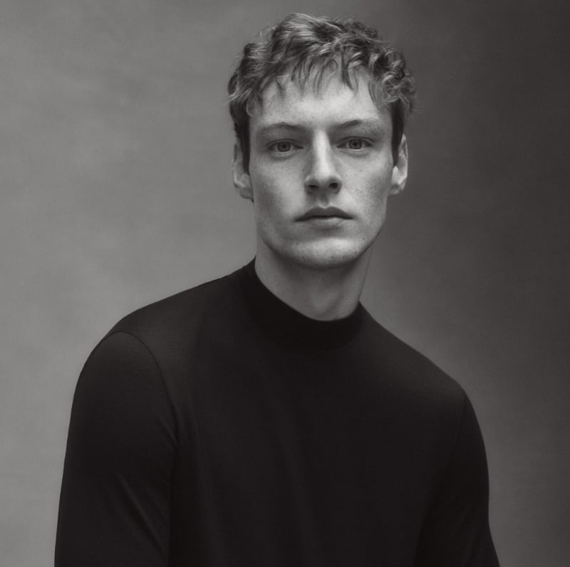A portrait of classic elegance, Roberto Sipos wears a JACQUES sweater.