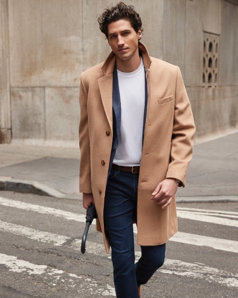 Ryan Kennedy is a chic vision clad in a classic camel coat by London Fog.