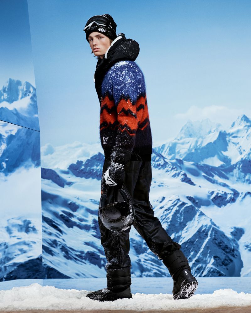 Indiana Van't Slot commands attention in a vibrant, snow-dusted knit sweater and sleek ski gear from Louis Vuitton.