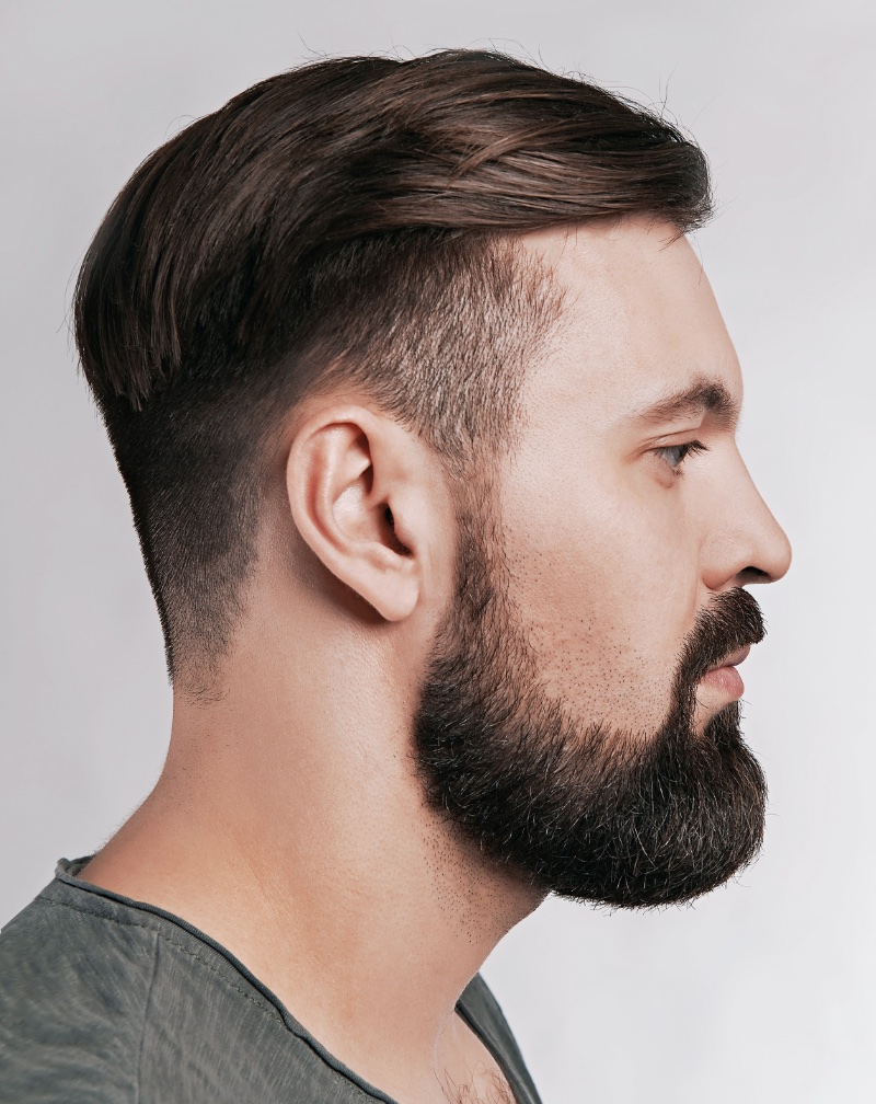 Portrait of a man with a side-swept undercut hairstyle on Craiyon