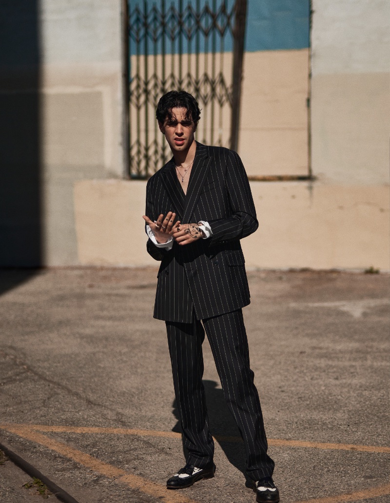 Stephen Sanchez dons a pinstripe suit by RHUDE.