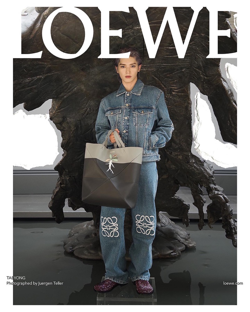 Taeyong stands out in a denim-on-denim ensemble for Loewe's pre-spring 2024 campaign.
