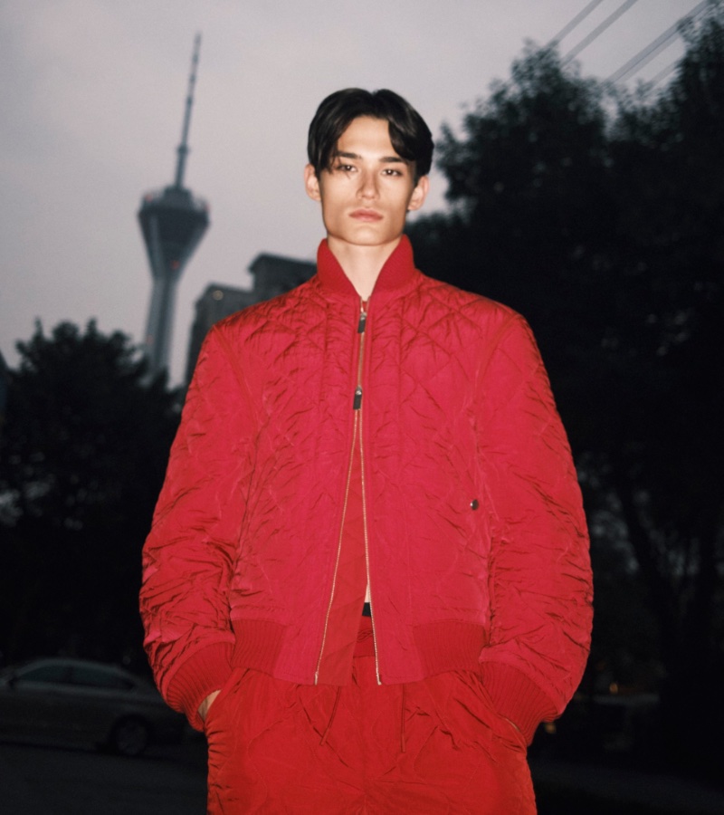 Alex Schlab goes sporty in a red bomber jacket for the Burberry Lunar New Year 2024 campaign.