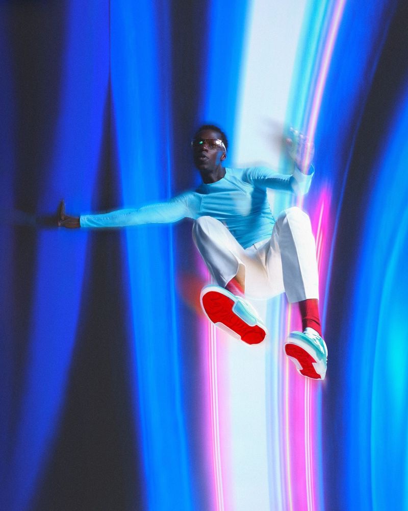 Captured mid-air, Abdou Ndiaye stars in the Christian Louboutin Astroloubi campaign.