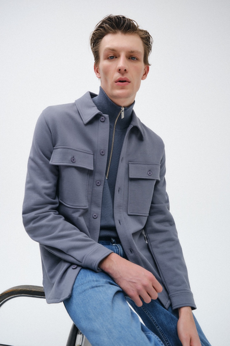 Finnlay Davis models a structured utility shirt from Closed's spring 2024 collection.
