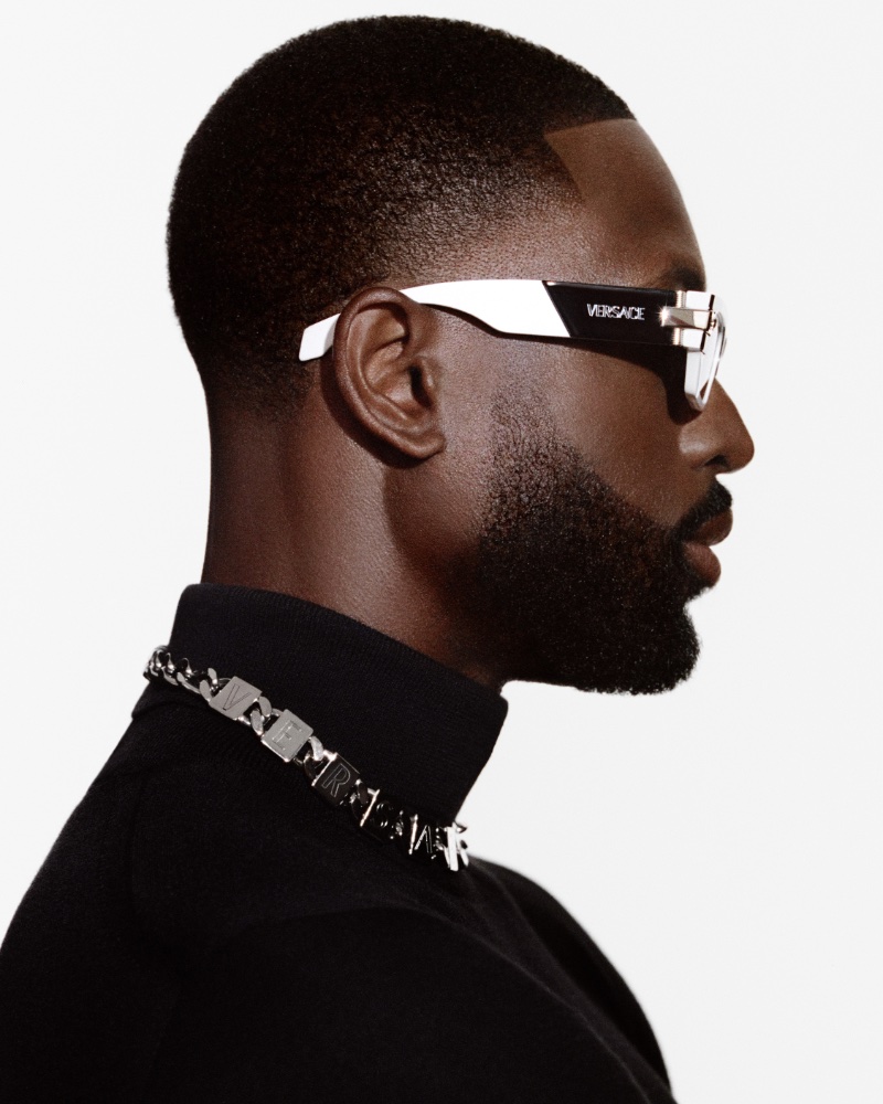 In Versace's new ad, Dwyane Wade turns heads with stylish eyewear accentuated by a silver chain collar detail.