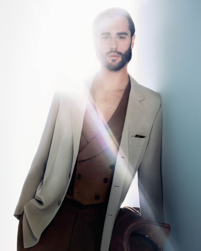 Fronting Giorgio Armani's spring-summer 2024 advertisement, Gianmarco Tamberi cuts a dashing figure in a light blazer layered over a double-breasted vest.