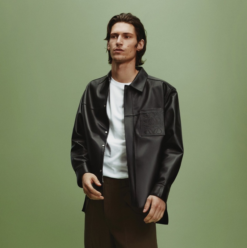 Justin Eric Martin wears a LOEWE leather debossed pocket overshirt from Holt Renfrew.